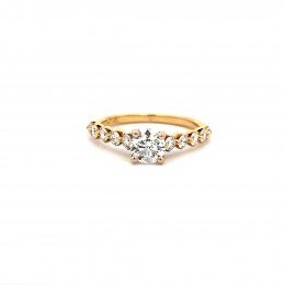 A 14k Yellow Gold Round Diamond Engagement Ring 