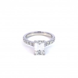 A Platinum Emerld Cut Engagement Ring 