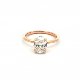 An 18k Rose Gold Oval Diamond Engagement Ring