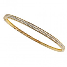 An 18k Yellow Gold Diamond Bangle