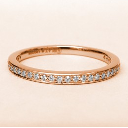 An 18k Rose Gold Diamond Band