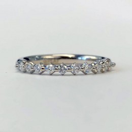 An 18k Rose Gold Twisted Band.