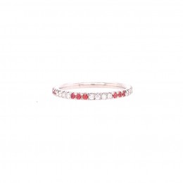 A Platinum Pink Sapphire And Diamond Eternity Band.