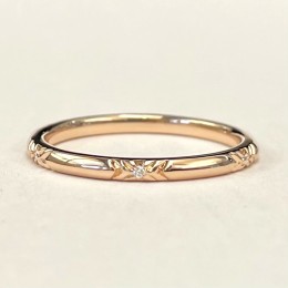 An 18k Rose Gold Diamond Band 