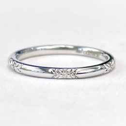 An 18k White Gold Diamond Band
