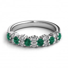 An 18k White Gold Emerald And Diamond Band