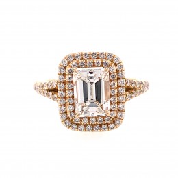An 18k Yellow Gold Emerald Cut Diamond Engagement Ring
