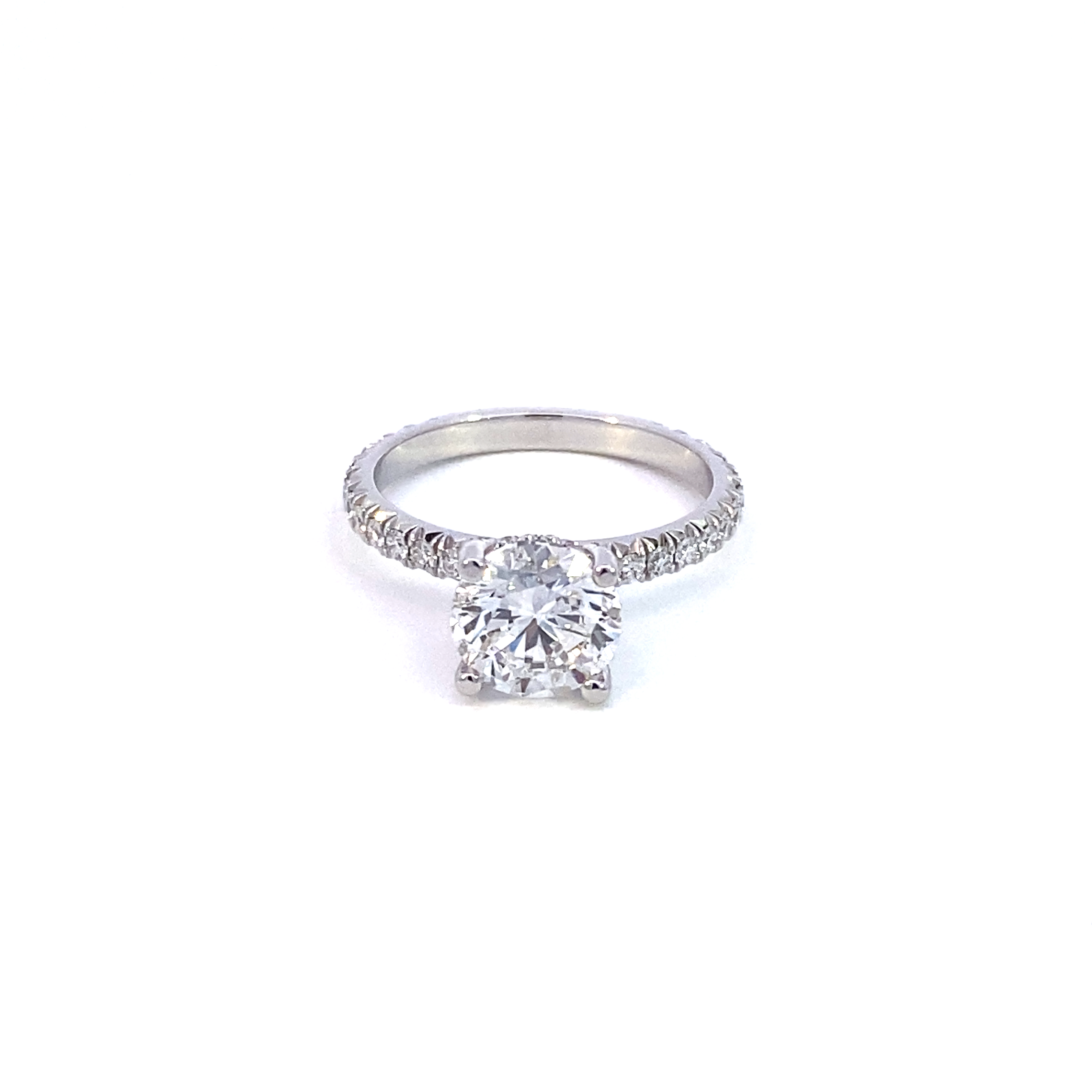 A Platinum Round Diamond Engagement Ring 