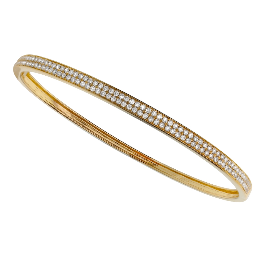 An 18k Yellow Gold Diamond Bangle