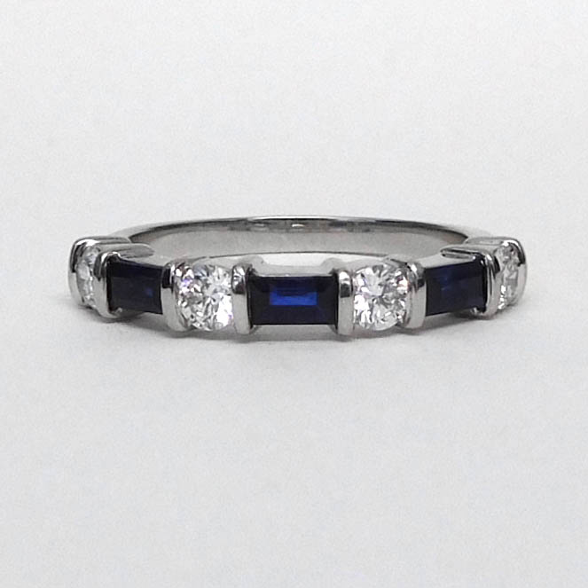 A Platinum Sapphire And Diamond Ring