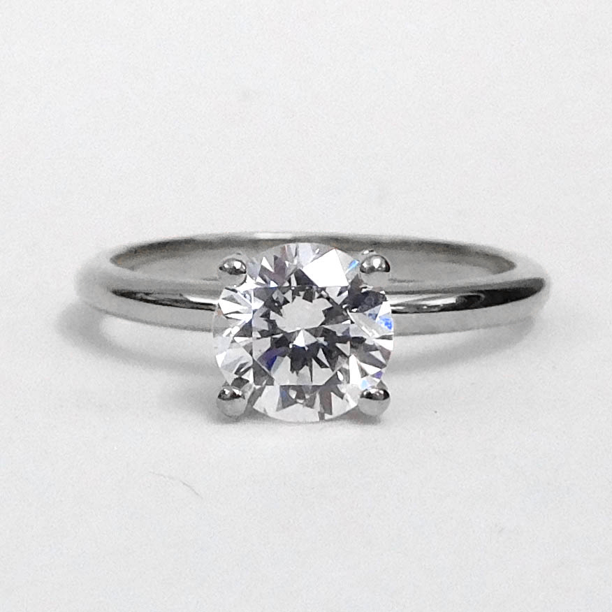 An 18k Yellow Gold Semi Mount Engagement Ring