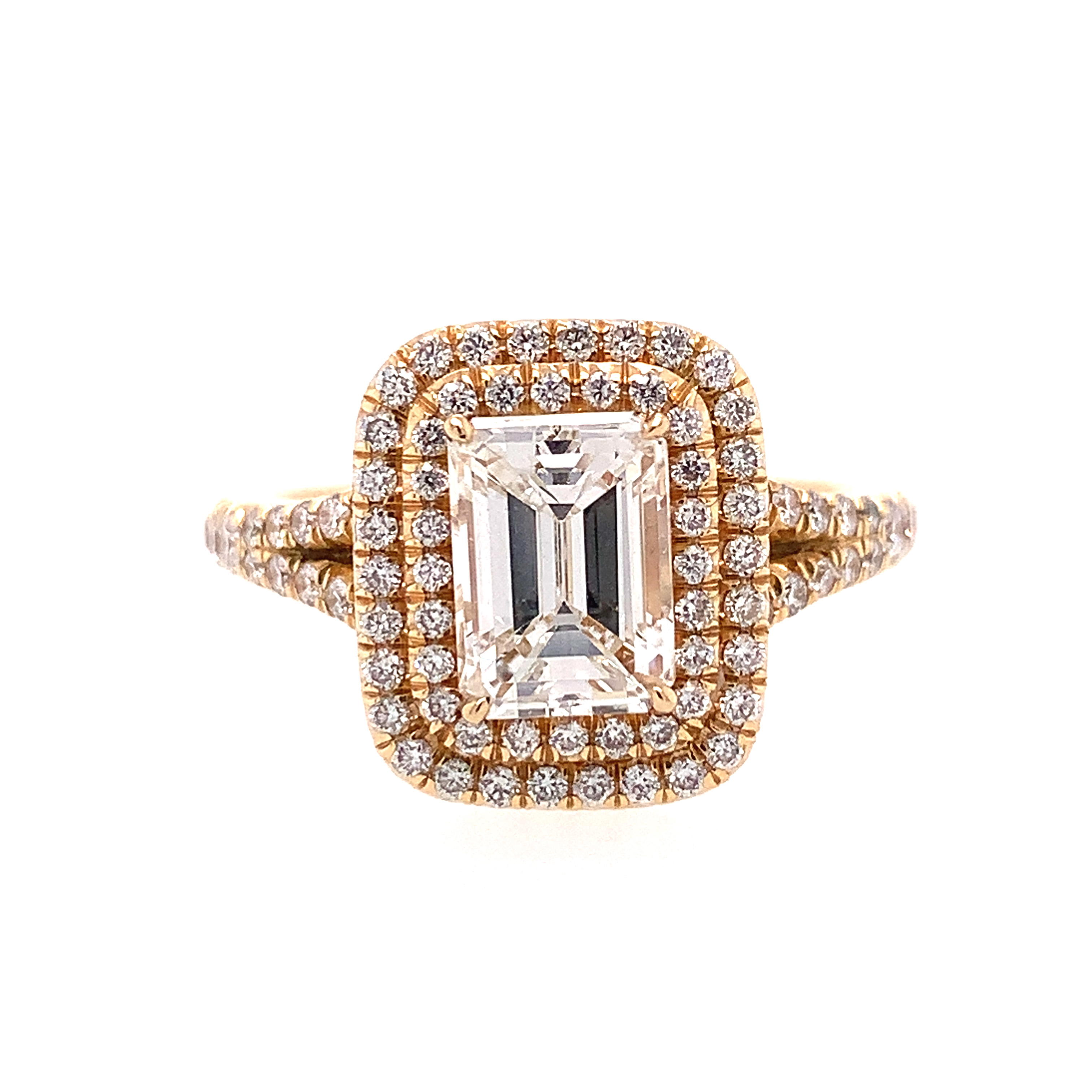 An 18k Yellow Gold Emerald Cut Diamond Engagement Ring